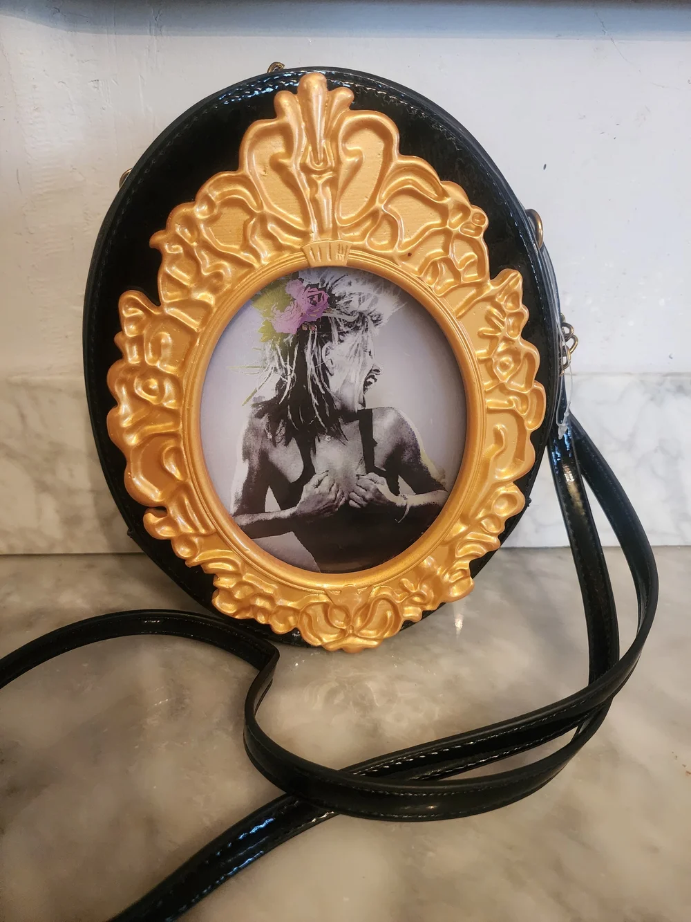 Betsey Johnson Black Oval Crossbody Bag with Gold Frame Accent
